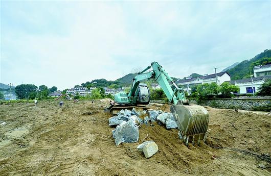 先干起来,重建最美乡村——英山百丈河村灾后重建侧记